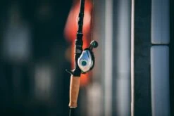 Quantum Energy S3 Baitcasting Reel -Fishing Products Store energy bc reel and rod side lifestyle